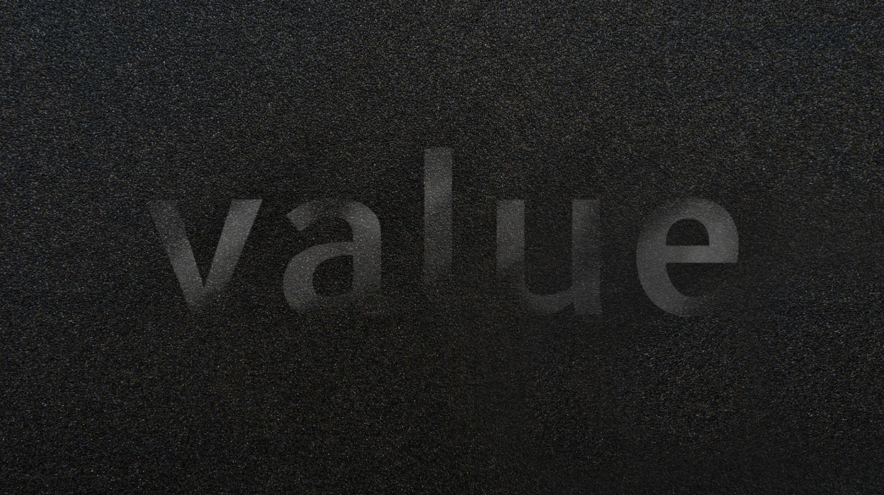 Animation of Dark Concrete with the Word Value Shining on Top
